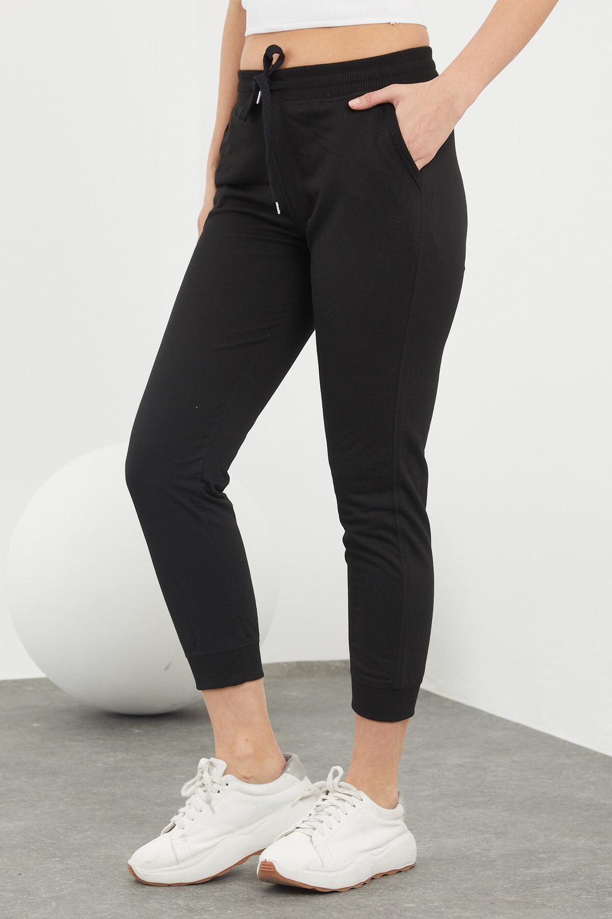 Beli ve Paçaları Lastikli Cepli Karyokalı Alt Eşofman