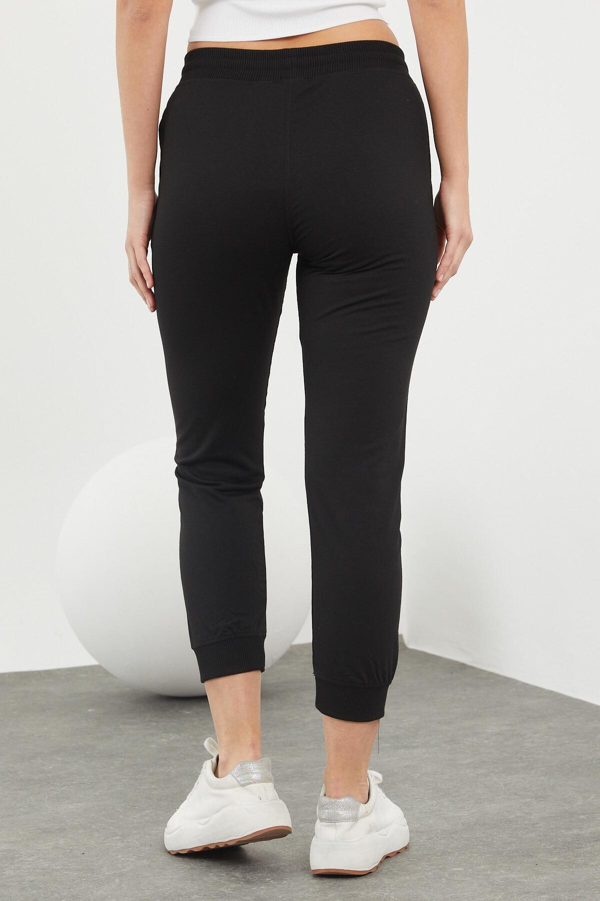 Beli ve Paçaları Lastikli Cepli Karyokalı Alt Eşofman