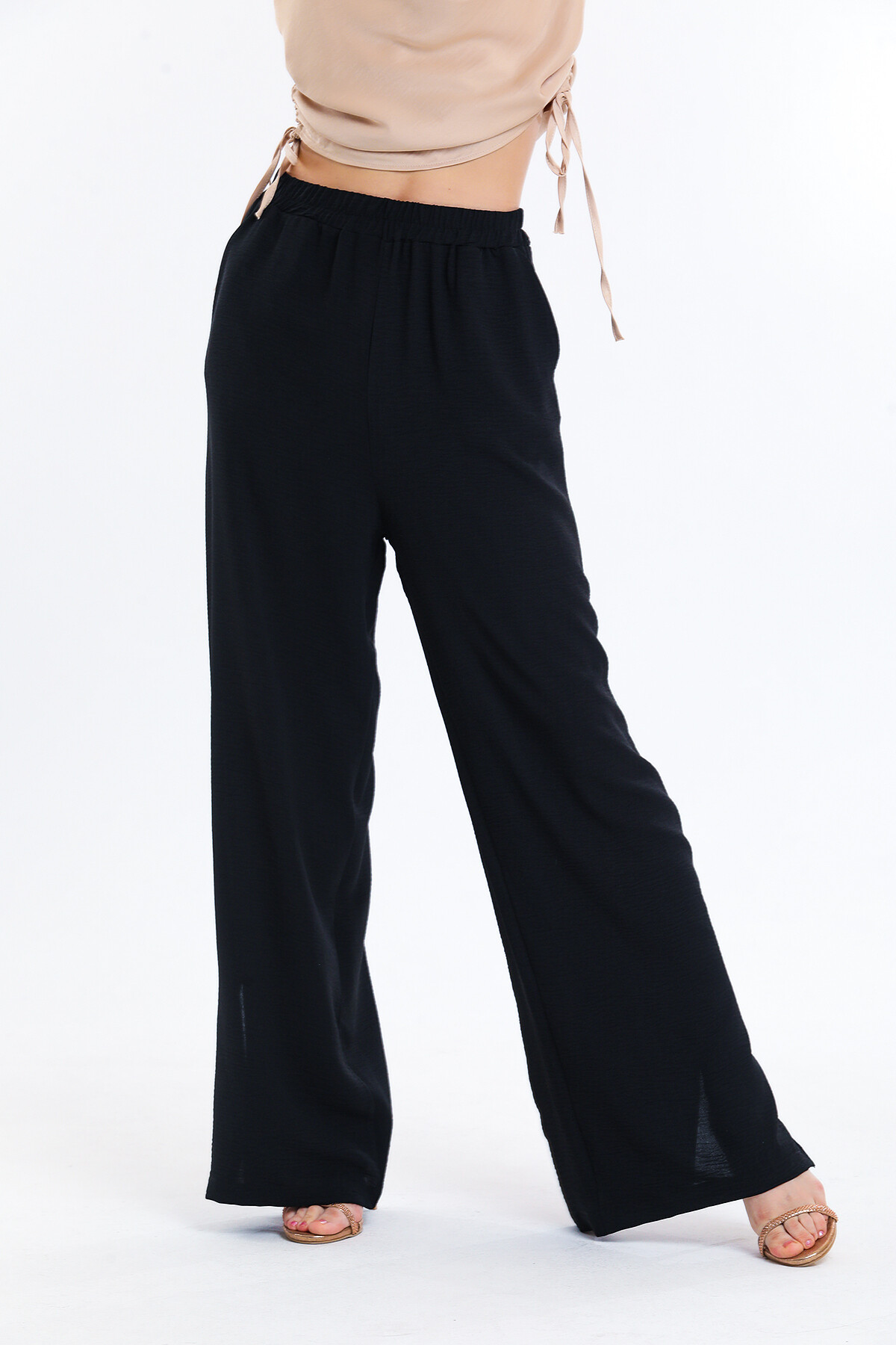 Paçaları Yırtmaçlı Beli Lastikli Cepli Yüksek Bel Bol Paça Pantolon