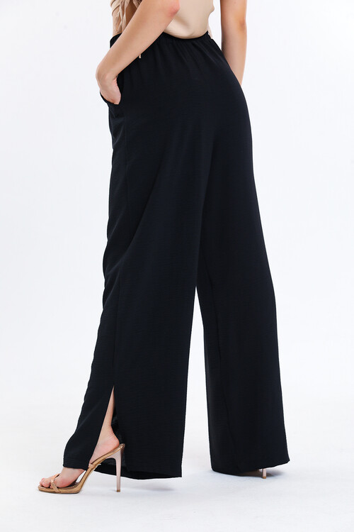 Paçaları Yırtmaçlı Beli Lastikli Cepli Yüksek Bel Bol Paça Pantolon